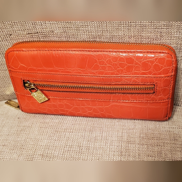 Anne Klein zippered wallet, orange with gold zippers and embellishment lock. - Picture 2 of 15
